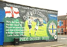 Healy's winning goal against England in 2005, depicted on a mural in Belfast Football mural, Belfast (1) - geograph.org.uk - 1410065.jpg