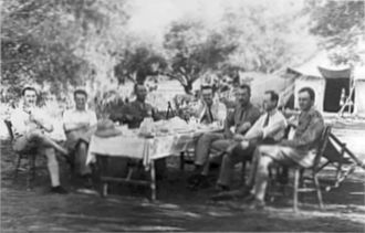 Wing officers seated in an olive grove in Ramleh HQ 40th (Army) Wing RAF - Officers seated in an olive grove.jpg