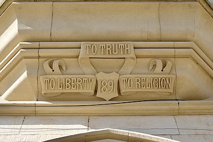 College Motto inscribed above Main Building entrance (2021)