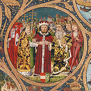 Enluminure médiévale montrant un roi entouré de dignitaires religieux.