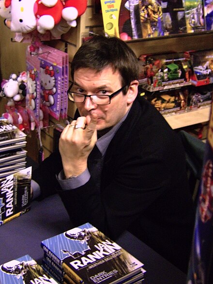 Rankin signing copies of his debut graphic novel, Dark Entries, in the Edinburgh Forbidden Planet International store in December 2009.