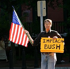 A protester calling for the impeachment of George W. Bush on June 16, 2005. Impeach Bush.jpg