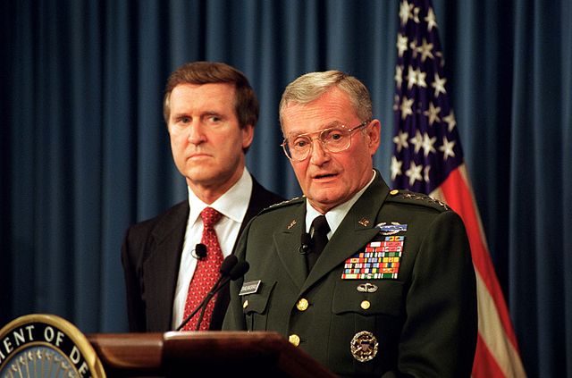 U.S. Secretary of Defense William Cohen (left) and Shalikashvili (right) at a Pentagon briefing on July 31, 1997.