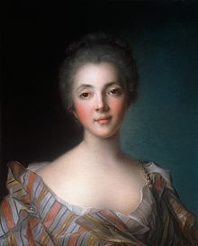 Portrait de face d'une femme « éveillée, coquette [...] l'air franc, amical, fripon et bon enfant » (Flaubert).
