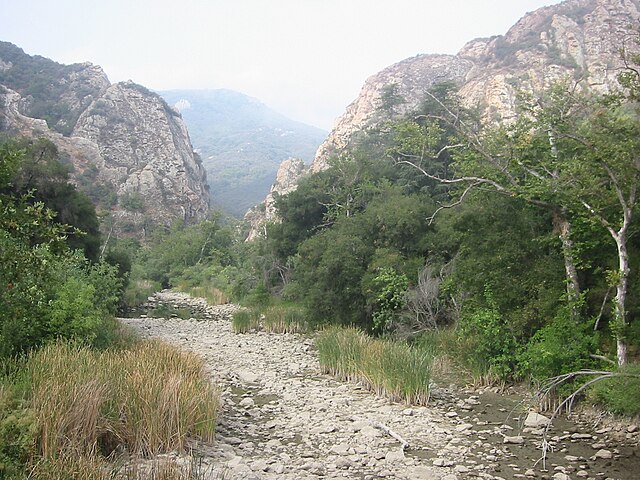 Malibu Creek, dry river bed, with the Goat Buttes in the background