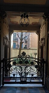 Entrance of Casa Guazzoni in Milan by Giovanni Battista Bossi (1904–1906)