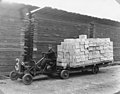 Man driving cart with stacked lumber, Bloedel-Donovan Lumber Mills, ca 1922-1923 (INDOCC 1113).jpg