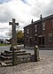 Market Place Standish - town cross and stocks.jpg