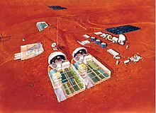 A vision for habitats published by NASA from CASE FOR MARS from the 1980s, featuring the re-use of landing vehicles, in-situ soil use for enhanced radiation shielding, and green houses. A bay for a Mars rover is also visible. MarsGroundHabitat.jpg