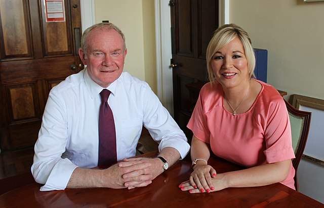 O'Neill with deputy First Minister Martin McGuinness in 2014