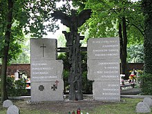 Monument to the Defenders of Katowice, described on the inscription as "Silesian insurgents, Boy and Girl scouts, murdered in 1939 by the Hitlerite invaders, in forests, streets and prisons of Katowice" Monument to the Defenders of Katowice 003.JPG
