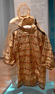 Seal intestine. Rear, an Eastern Arctic garment made of summer gut; front, an Alaskan garment made of winter gut (imarnin in the Yup'ik language of the Yup'ik and Cup'ik ). Parka c1900 Linden-Museum.jpg