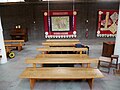 Pews in the Church of Saint Paul in Bow Common, built in 1958. [386]