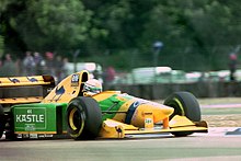 Patrese driving the Benetton B193B during practice for the 1993 British Grand Prix Riccardo Patreses - Benetton B193B during practice for the 1993 British Grand Prix (32873450823).jpg