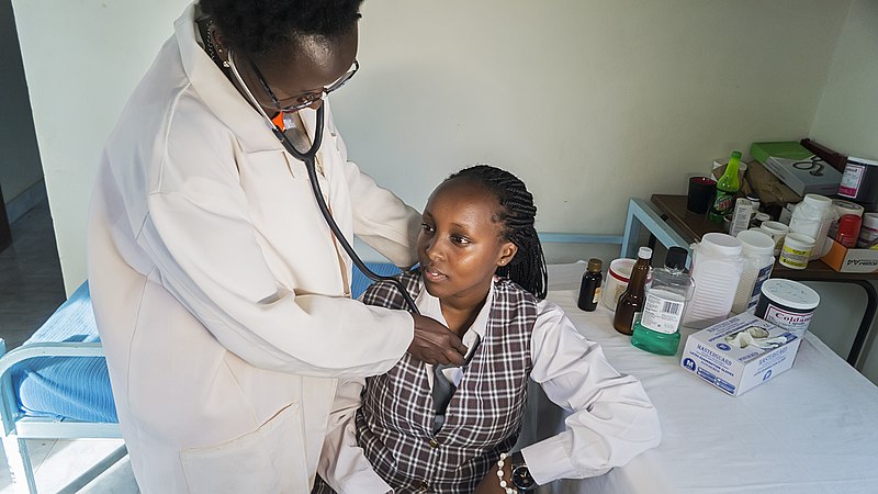 File:School nurse checks student's health.jpg