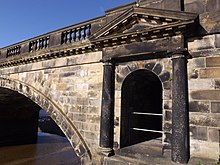 Late 18th-century Doric aedicula on Skerton Bridge, Lancaster, Lancashire Skerton Bridge, Lancaster, England - aedicula detail.JPG