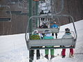 Skiers on chairlift.JPG
