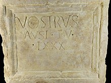 Détail d'une inscription latine dans un cadre