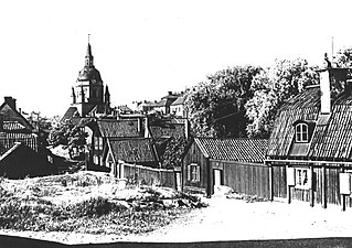 Stigbergsgatan 23 (närmast), 21, 19 och 17, Katarina kyrka i bakgrunden.