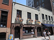 The Stonewall Inn in Greenwich Village, a designated National Historic Landmark as the site of the 1969 Stonewall Riots.[36]