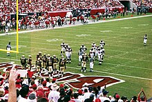 Game action between the Buccaneers and Saints at the 2002 Opening Day meeting. TampaBayNewOrleansSept2002.jpg