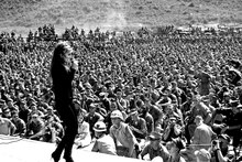 Ann-Margret performing for U.S. service personnel in Vietnam in 1966 Thousands of service personnel listen to Miss Ann-Margret sing one of her numbers during her show in Danang, Vietnam. - NARA - 532506.tiff