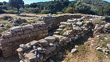 The tholos tomb at Voidokilia in Messenia, dubbed the "Tomb of Thrasymedes" by Marinatos Tombe a tholos Voidokilia 2.jpg