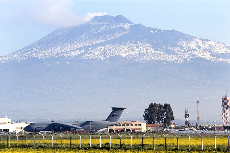 File:US Navy 030325-N-9693M-001 Sicily's volcano, Mt. Etna, is the backdrop for a U.S. Air Force C-5 and the air terminal of Naval Air Station (NAS) Sigonella.jpg