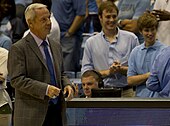 Roy Williams US Navy 111027-N-QF368-439 Roy Williams, head coach of the University of North Carolina basketball team, walks out to his team during an exhibition.jpg