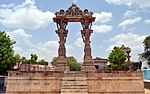 Vadnagar's Kirti Toran full shot with beautiful clouds.JPG