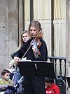 Violonista ambulante en la calle