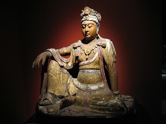 A Chinese wooden Bodhisattva from the Song Dynasty (960–1279 CE), in the position of royal ease