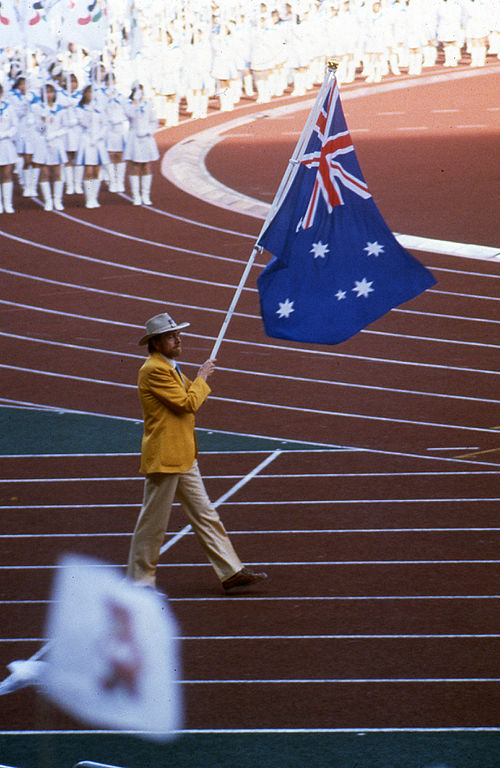 Flag bearer Paul Croft at the Opening Ceremony