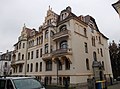 Double tenement house with enclosure