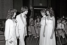 Couple prom in late 1970s men wear Powder Tuxedo women wear Sleeve dress. 1979-1980-Prom-03.jpg