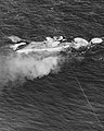 Nevada sinking after serving as a target ship, 31 July 1948.