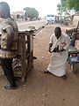 A man selling fowls in Northern part of Ghana