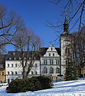 Town hall in half-open development in a corner