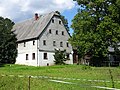 Residential stable house, barn and side building of a three-sided courtyard