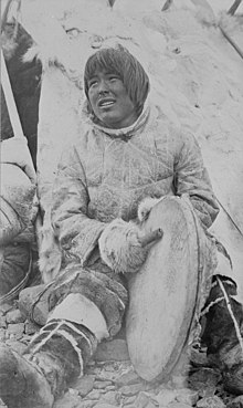 Aniurunna, Inuit man, singing and playing drum.jpg