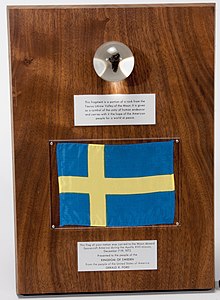 The Swedish Apollo 17 lunar sample display consisting of a Moon rock fragment from a lava Moon stone. Apollo 17 mansten.jpg
