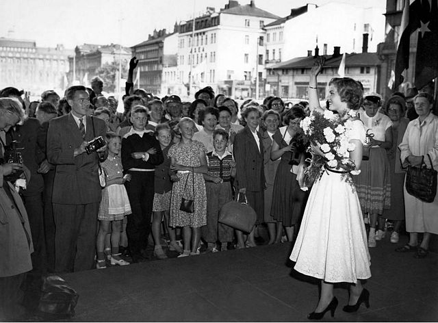 Armi Kuusela, the first titleholder, meets people in Helsinki, Finland.