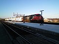 Belleville VIA Rail station with CN freight train 675A0070 (6505503125).jpg