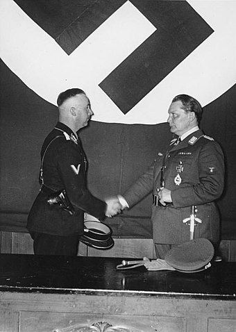 Heinrich Himmler and Hermann Göring at the meeting to formally hand over control of the Gestapo (Berlin, 1934).