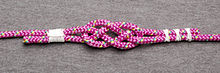 Seized carrick bend. The seizings preserve the initial shape of the knot. Carrick-bend-seized-ABOK-1439.jpg