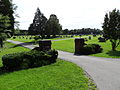 The east entrance of Clover Cemetery. Located on Mt Laurel Road in Clover, Virginia about two miles west of that road's intersection with SR 92.