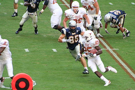 Tailback Jamaal Charles of the 2006 Texas Longhorns football team rushes for a first down vs the Rice University Owls September 16, 2006.