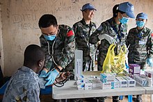 Military and MONUSCO medical staff performing medical consultations at a Kabare Territory prison in the Democratic Republic of the Congo Consultations medicales a la Prison de Kabare gratuites par le BCNUDH et le personnel medical militaire de la MONUSCO 02.jpg