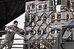 Loading cargo secured within a cargo net Defense.gov photo essay 110313-F-BW907-155.jpg