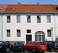 Terraced house, workshop building and garden wall